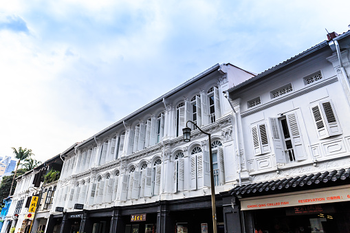 Chinatown, Singapore - 22 May 2020: facade of colorful old shophouse at ChinaTown in Singapore.