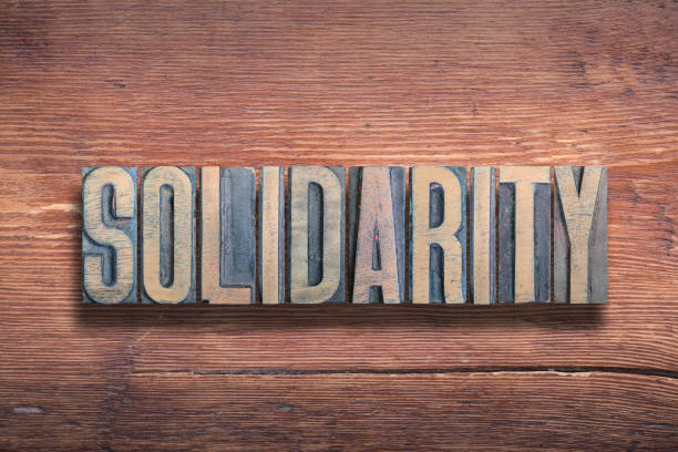 istock solidarity word wood 1226417297
