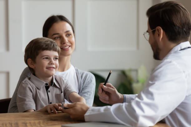 istock Mother with small son do checkup at make pediatrician 1226418572