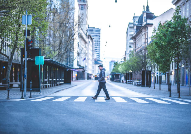 istock Crossing a street 1226421809