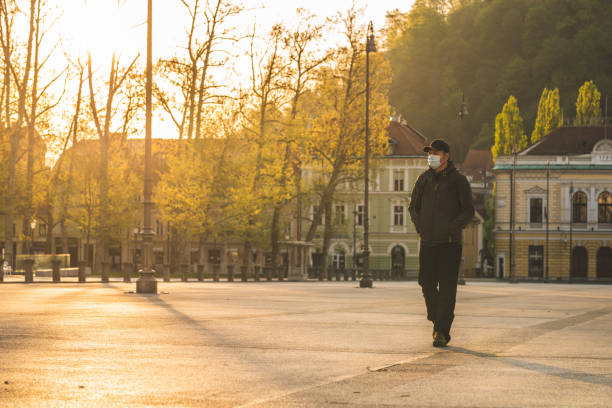 istock Walking with mask on the face 1226421918
