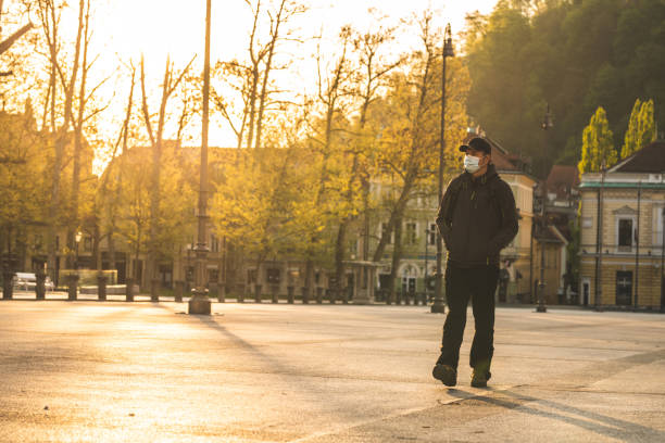 istock Walking with mask on the face 1226421928
