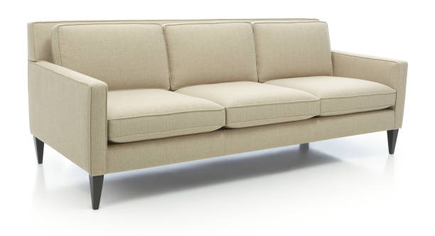 istock Three seats cozy color fabric sofa isolated on white. 1226422205