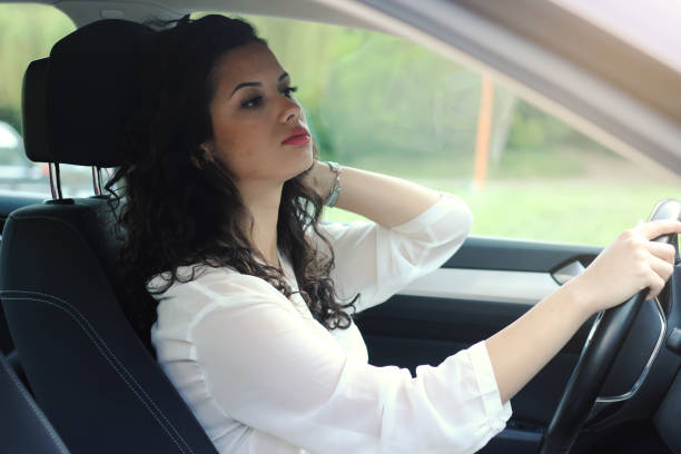 istock Businesswoman driving car 1226424853
