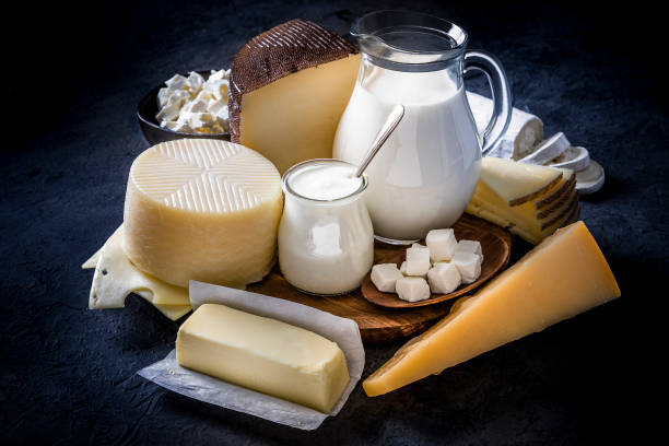 istock Various kinds of dairy products on a dark bluish background 1226425128