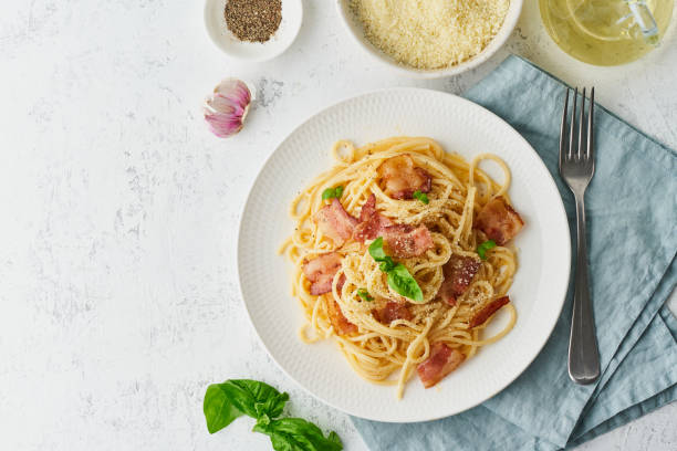 Carbonara pasta. Spaghetti with pancetta, egg, parmesan cheese and cream sauce stock photo