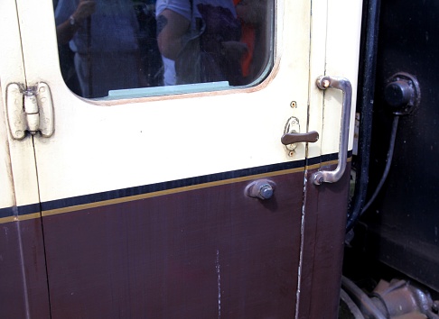 Close up of old-fashioned train door