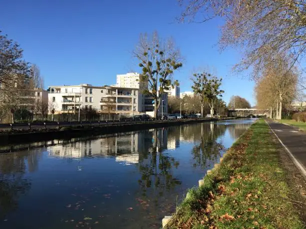 Photo of The Burgundy Canal in the Dijon area in east-central France. It connects the Yonne at Migennes with the Saône at Saint-Jean-de-Losne. Construction began in 1775 and was completed in 1832.