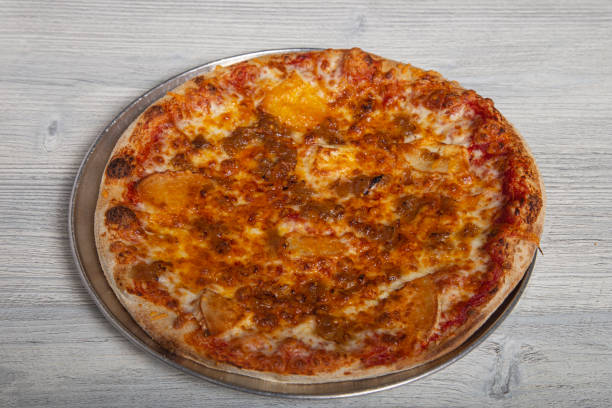 istock White artisan pizza isolated on wooden background. Menu card image 1226435318