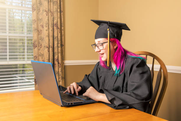 istock Graduate on Laptop at Home 1226437702