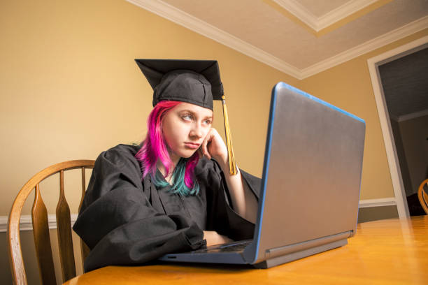 istock High School Grad Sad About Graduating Online 1226437891