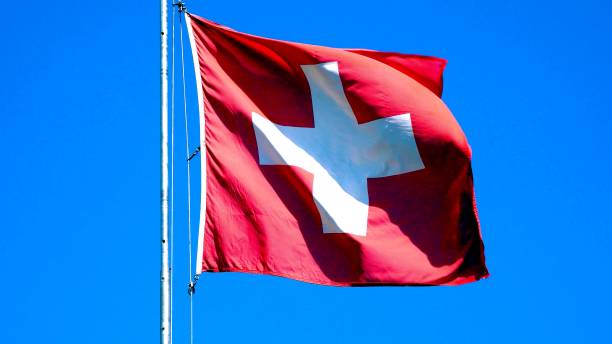 istock Close-up on a Swiss flag in the wind 1226443696