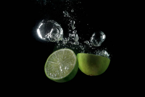 istock lemon entering the water and splashing 1226444608