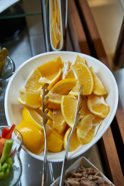 istock Lemon wedges in a white bowl as an appetizer 1226446364