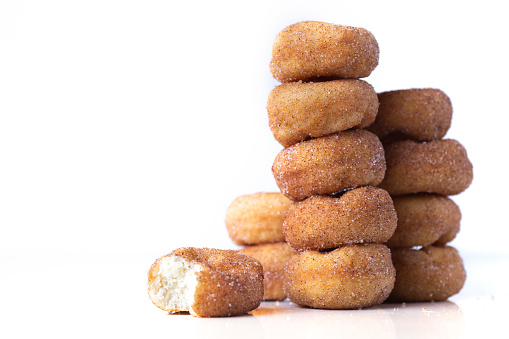 Cinnamon Sugar Mini Donuts on a white background