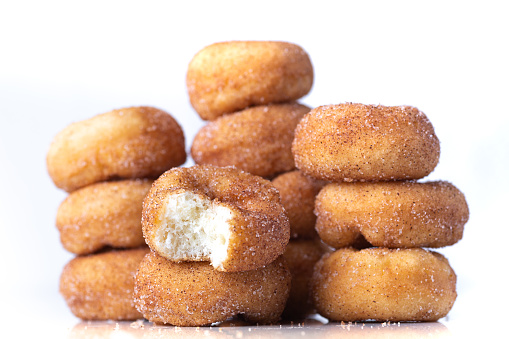 Cinnamon Sugar Mini Donuts on a white background