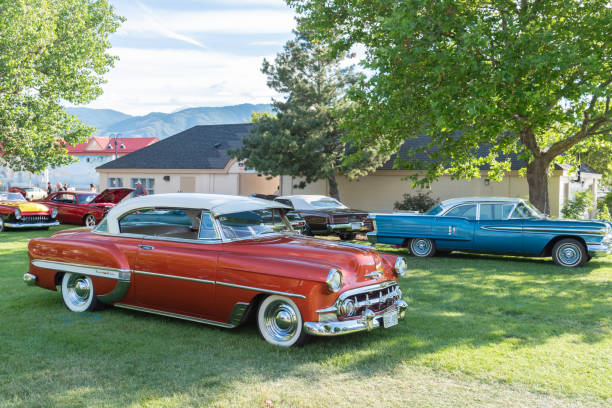 1954 Chevrolet Bel Air hard top parked by Okanagan Lake at car show Penticton, British Columbia/Canada - June 22, 2019: 1954 Chevrolet Bel Air hard top on display at the Peach City Beach Cruise, a popular annual car show and one of the largest car shows in North America. bel air photos stock pictures, royalty-free photos & images