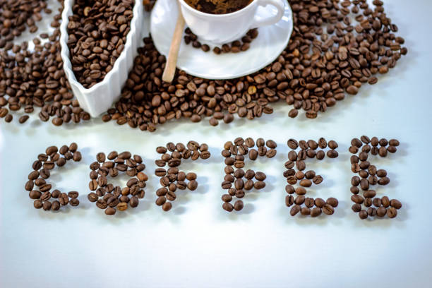 istock White cup of coffee and coffee beans. 1226457936