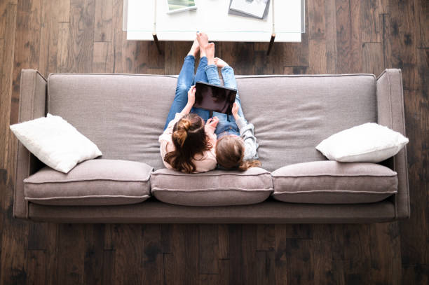 istock Sisters watch video while quarantined during coronavirus crisis 1226458592