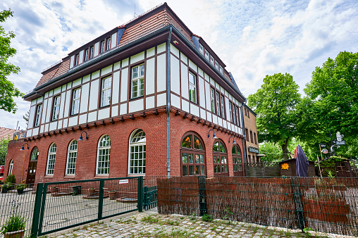 Berlin, Germany - May 22, 2020: Former historic fire station with a brick facade and half-timbering in Berlin, Germany.