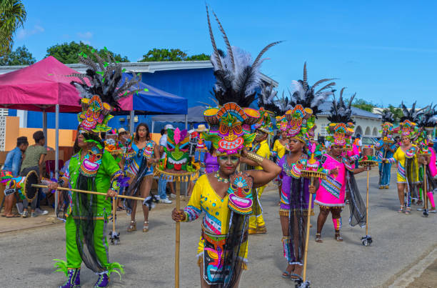 Kralendijk, Bonaire - February 25: Beautiful parade colorful costume and smiling people during Carnaval street parade in Kralendijk, Bonaire