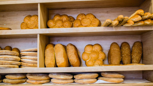 istock Fresh bread on shelves in a bakery 1226463454