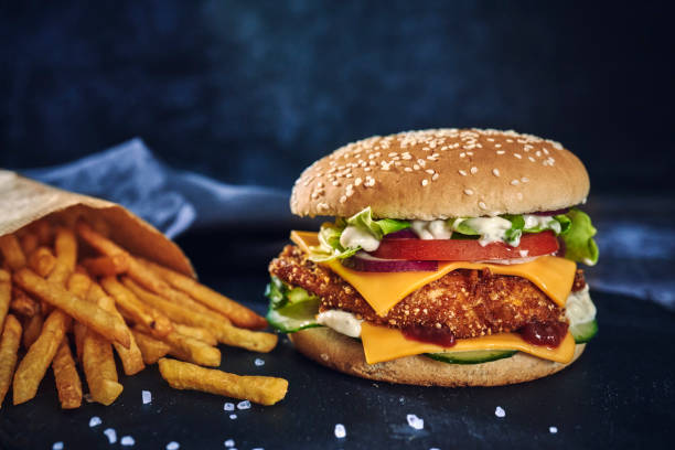 istock Crispy Chicken Burger with Cheese, Tomato, Onions and Lettuce 1226464248