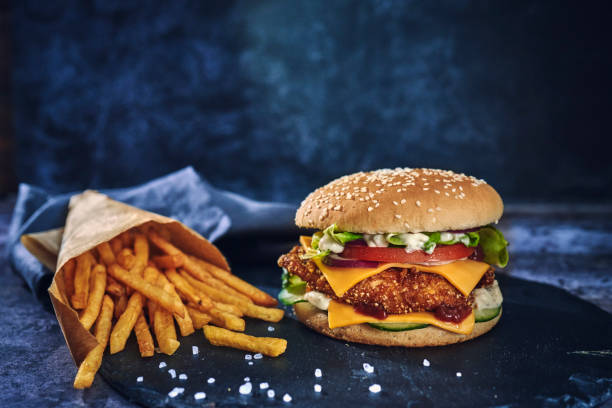 istock Crispy Chicken Burger with Cheese, Tomato, Onions and Lettuce 1226464279