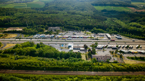 istock German highway and highspeed train railroad track - aerial view 1226464829