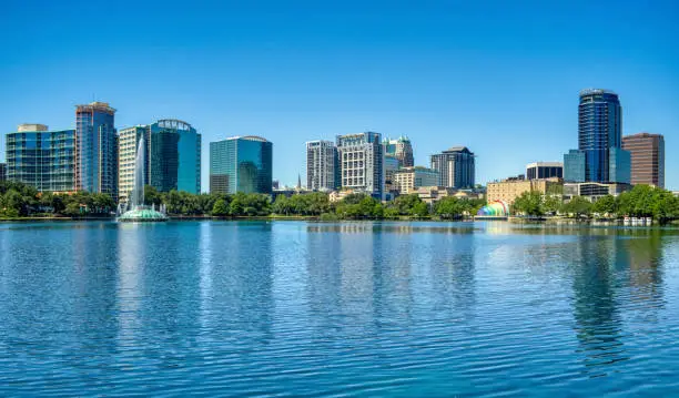 Orlando Florida downtown skyline during the springtime over Lake Eola.