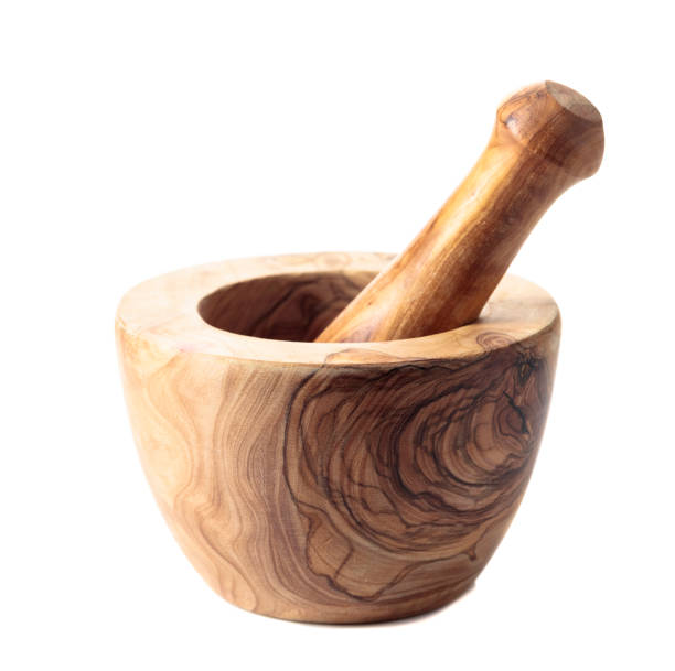 istock Wooden mortar and pestle isolated on a white background. 1226467006