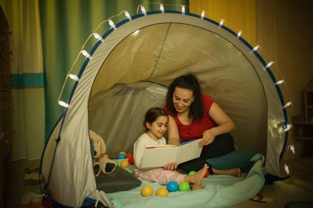 istock Mother and daughter camping 1226467610