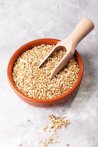 istock Raw green buckwheat in a brown clay bowl 1226469342