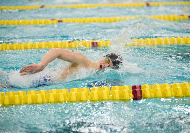 istock Young Man Swimming Freestyle 1226470031