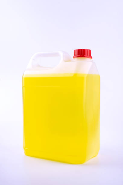 istock Plastic canister with pen and red cap, yellow liquid, mock up object, isolated on white background. 1226470222
