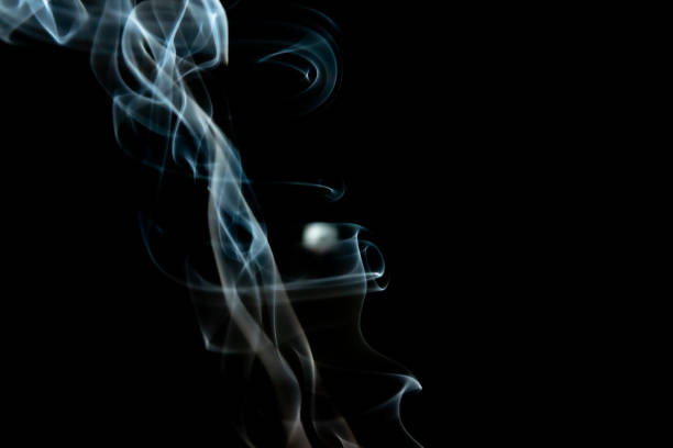 Abstract, white smoke isolated on black background. Isolate
