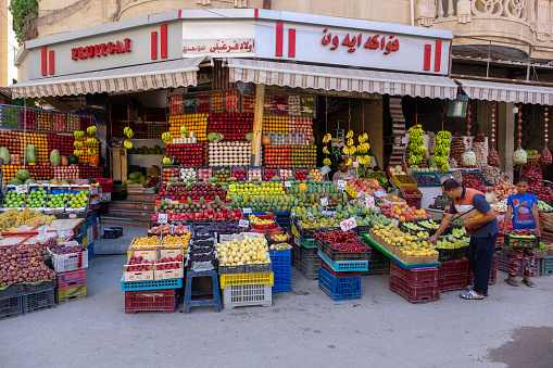 A seller at a vegetable and fruit store, Alexandria, Egypt, September 3, 2019