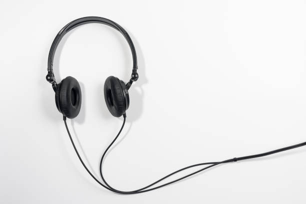 istock Black headphones isolated on the white background 1226475849
