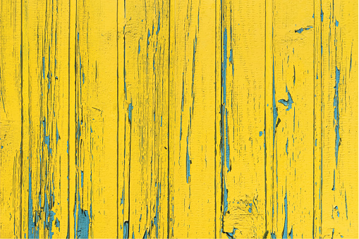 Peeling Paint Wooden Texture Panels Yellow and Blue Backdrop Copy Space Vintage Grunge Background