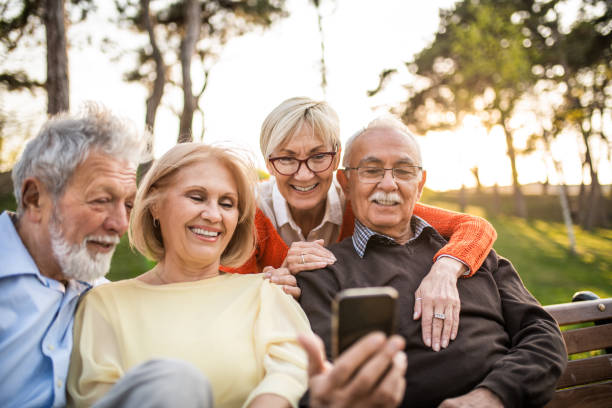 istock Group of seniors using mobile phone. 1226477910