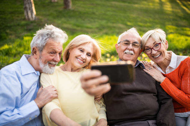 istock Group of seniors making a self portrait 1226477931