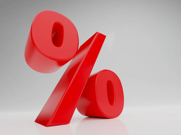 istock Red color percentage sign on white wall background three dimensional 1226478074