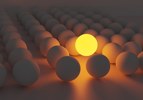 Stand out from the crowd different light color sphere 3d render