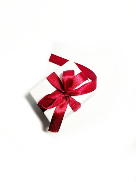 istock gift box with red ribbon isolated 1226480684