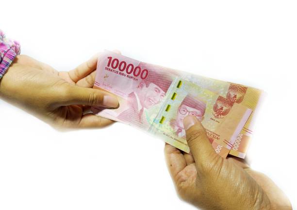 istock Kebumen. Central Java. Indonesian. 22 May 2020. Indonesian money for THR (Holiday Allowance) during Eid al-Fitr or Employee Salary 1226482014
