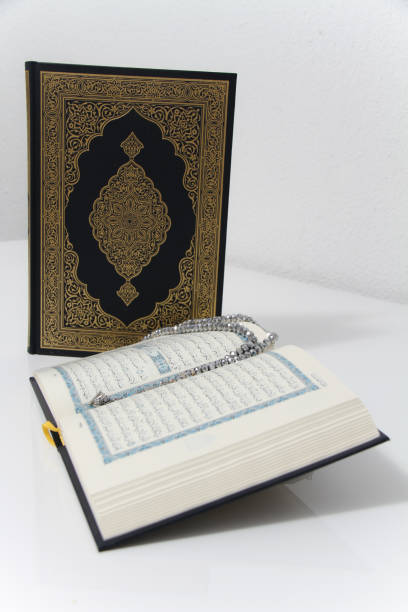 istock Holy islamic book Koran and prayer beads 1226482670