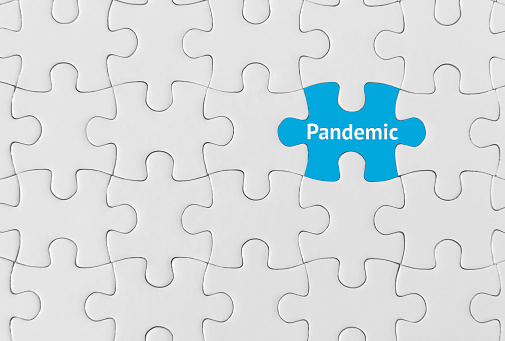 Puzzle pieces with word ‘Pandemic’
