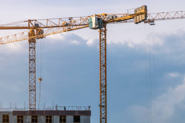 istock Building constraction site with 2 yellow cranes. Growth concept. Copy space for text. 1226483829