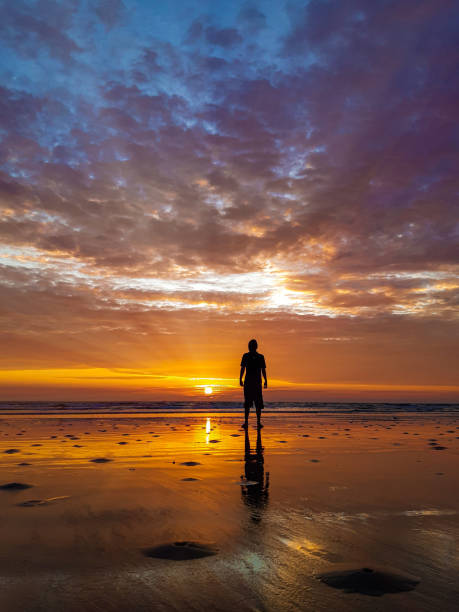 istock Silhouette Of Man At Sunset On The Beach 1226489379