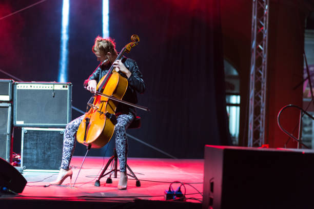 istock Woman playing cello on the stage 1226497570